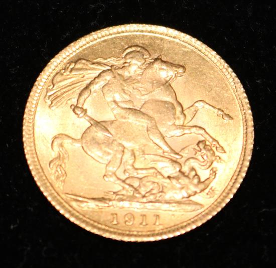 A George V 1911 gold full sovereign.